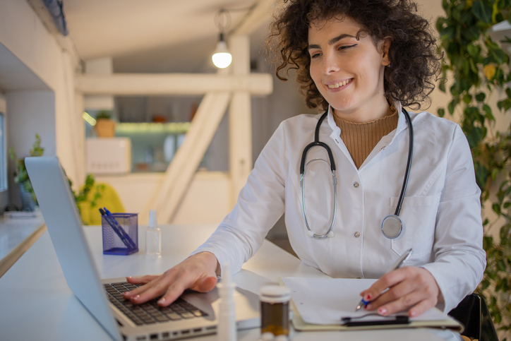 Oncology nurse navigator with a patient